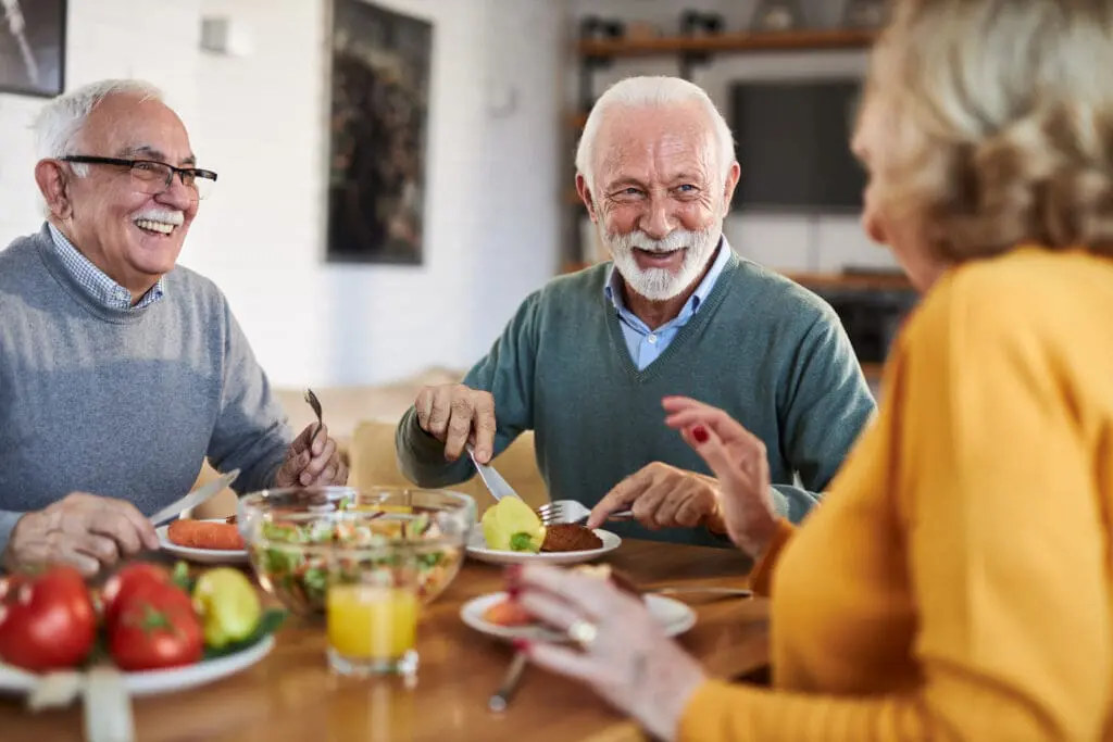 older adults enjoying energy foods for seniors at The Arlington of Naples in FL.