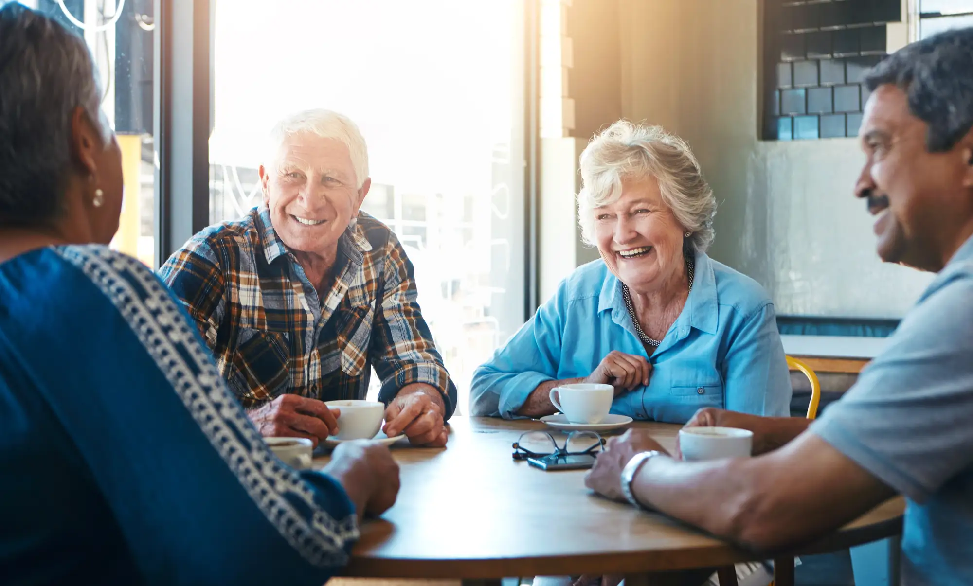 Seniors discussing LifeCare at The Arlington of Naples